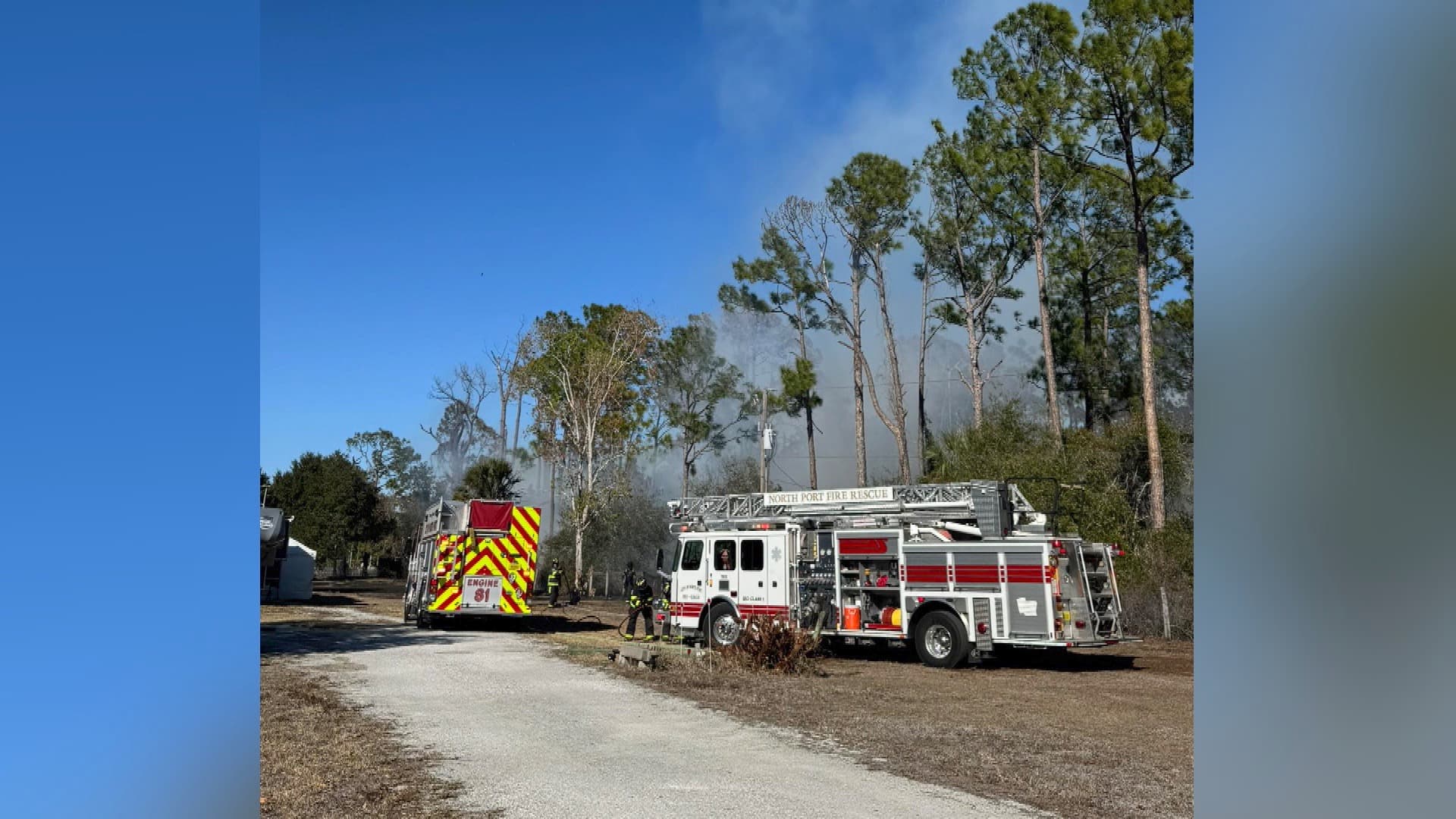 Brush fire threatens homes in North Port Estates