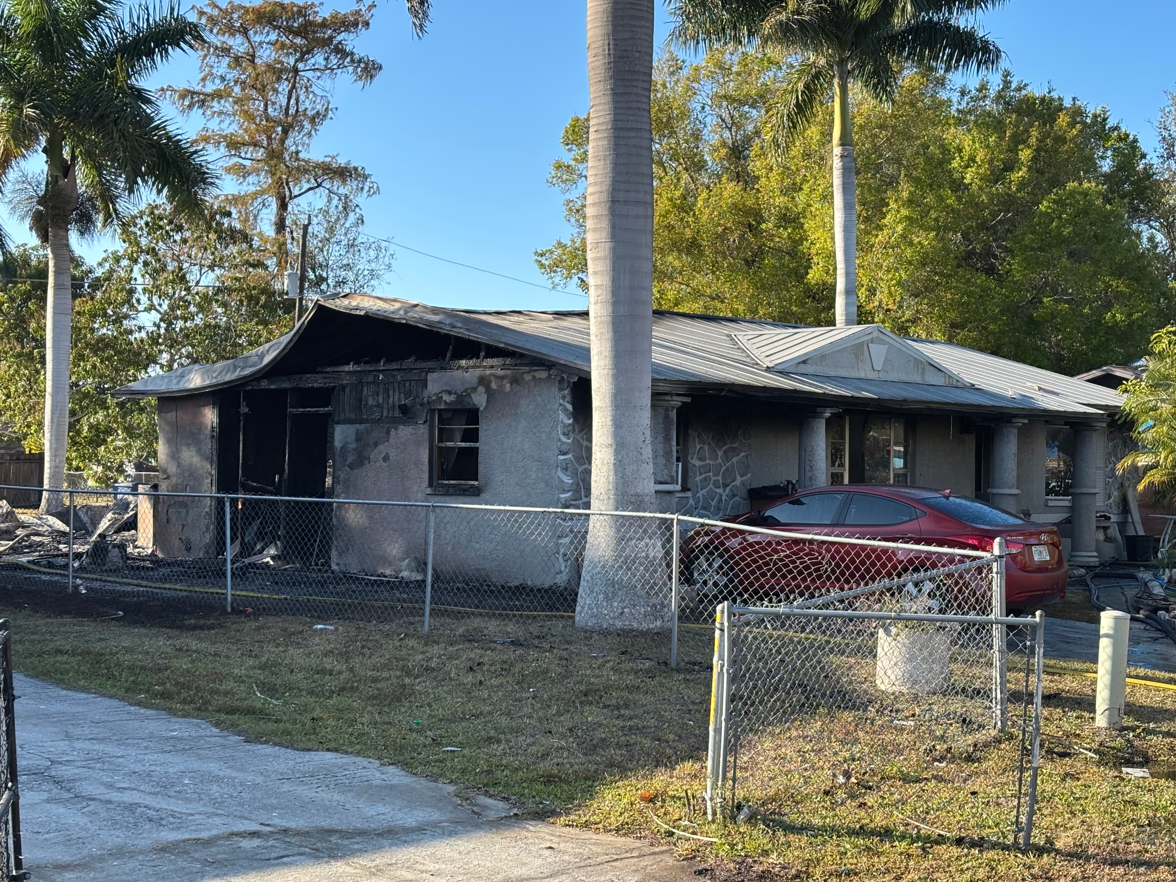 One woman injured after house fire in Fort Myers
