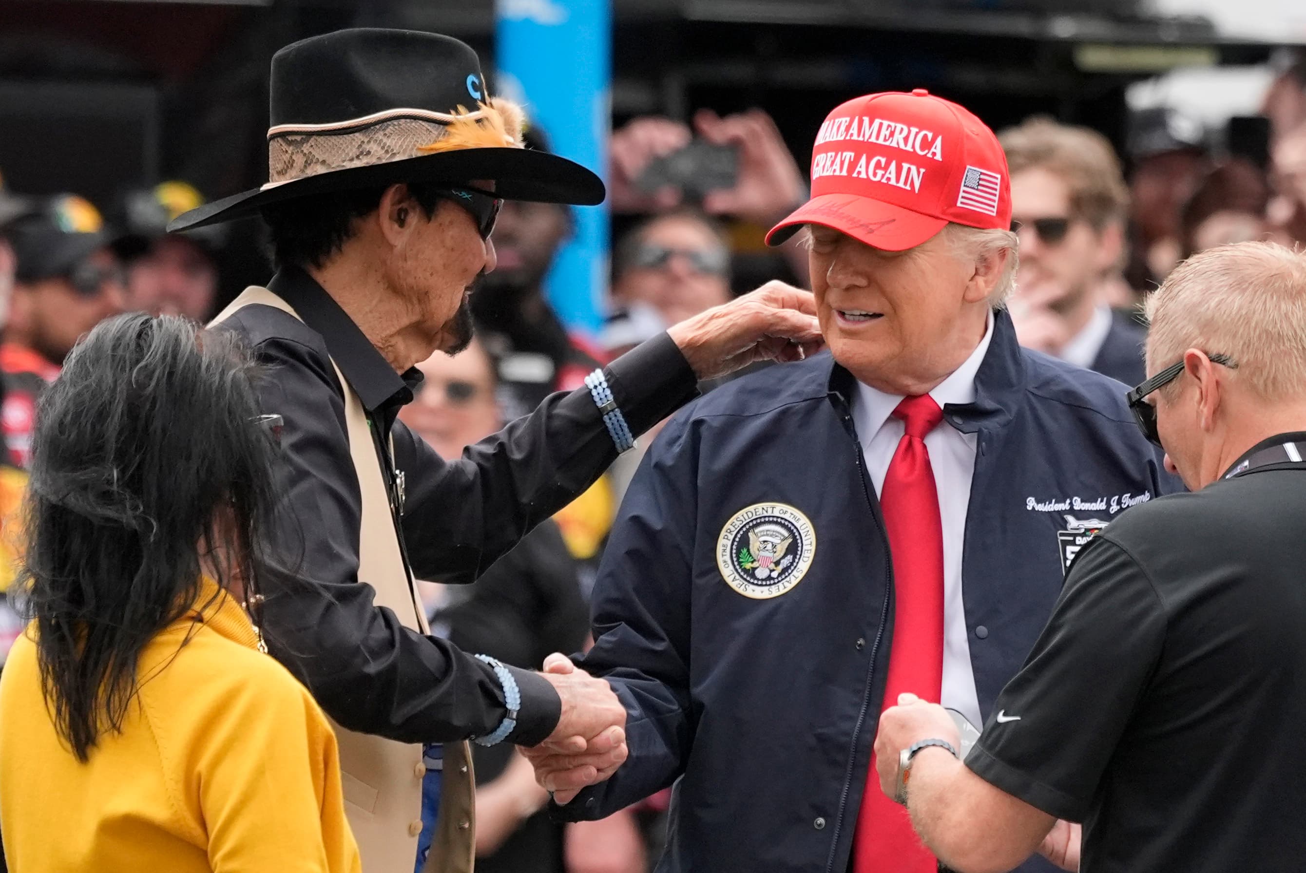 Daytona 500 stopped by rain with Trump on hand for NASCAR's biggest race