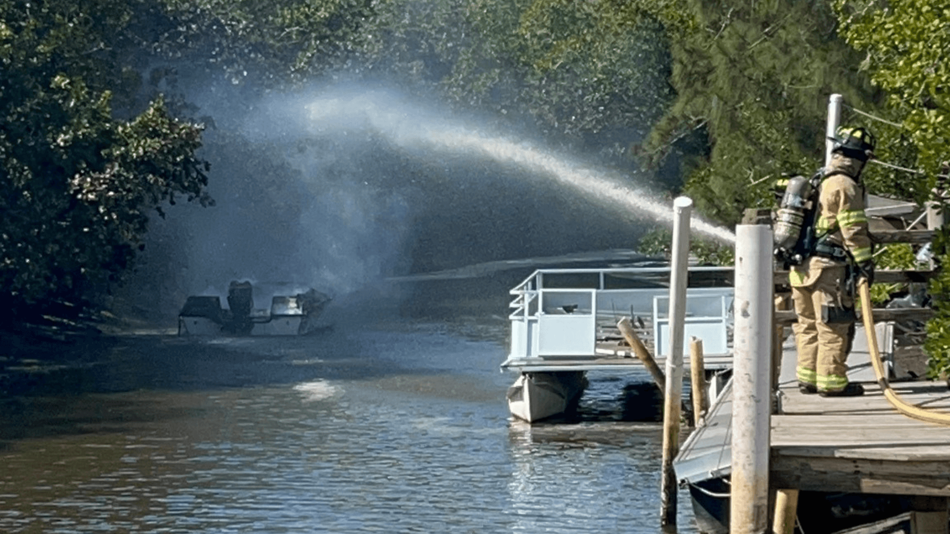 Boat catches fire along Mullock Creek in south Fort Myers