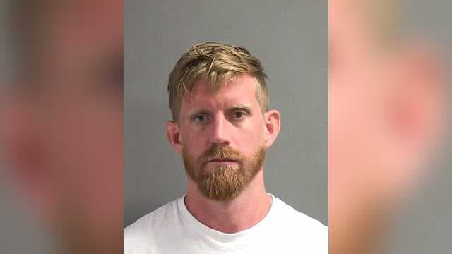 Man arrested in Daytona Beach after dangling, dropping child off second-floor resort balcony