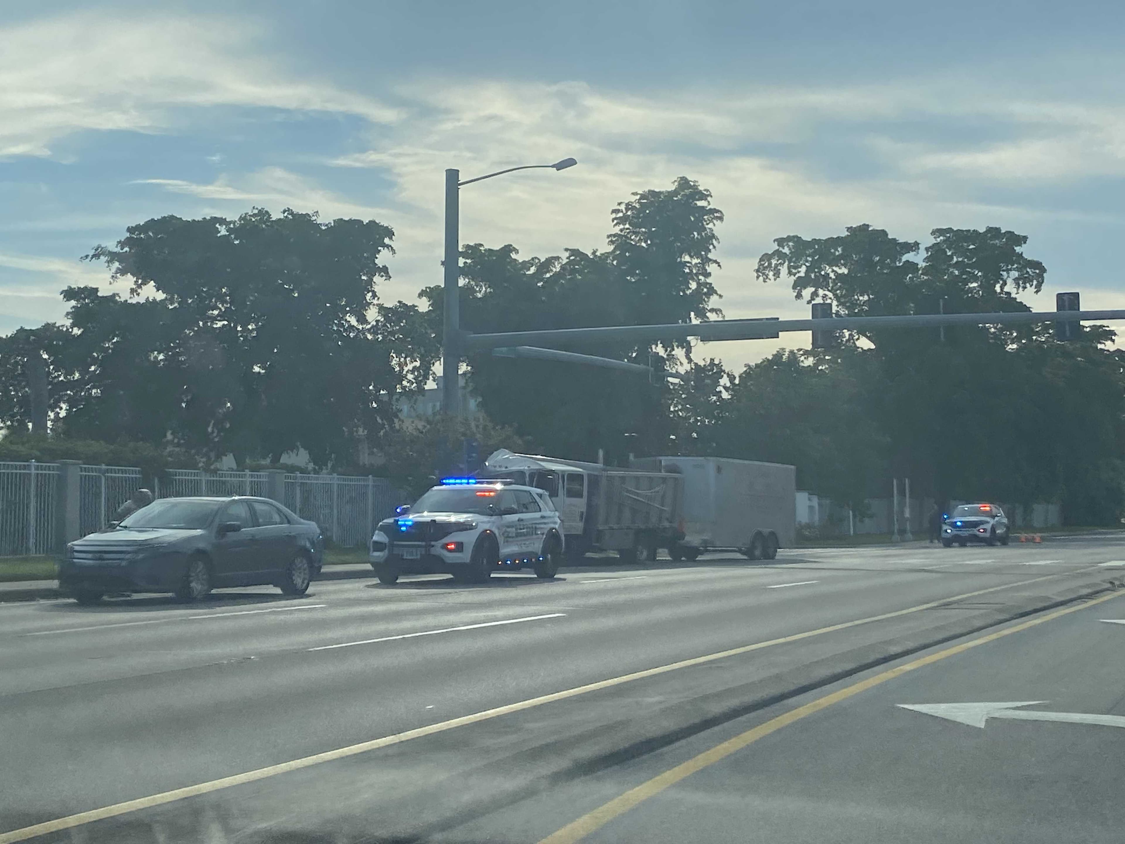 Child transported to hospital after school bus and landscape truck crash in Lee County