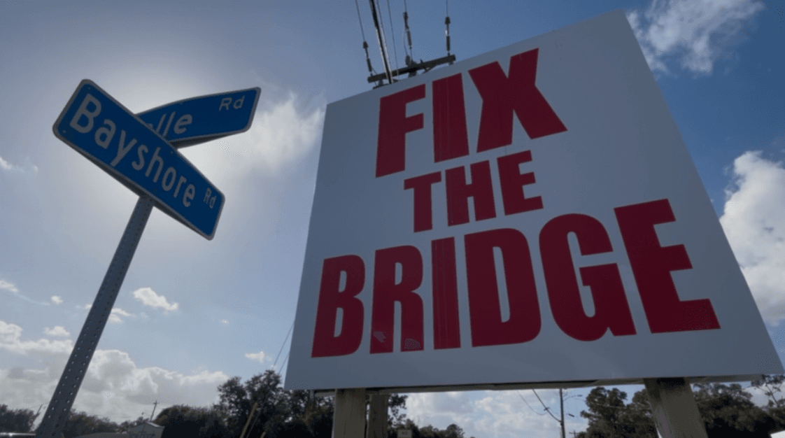 'Fix the Bridge' sign sparks questions for those driving past it in Fort Myers