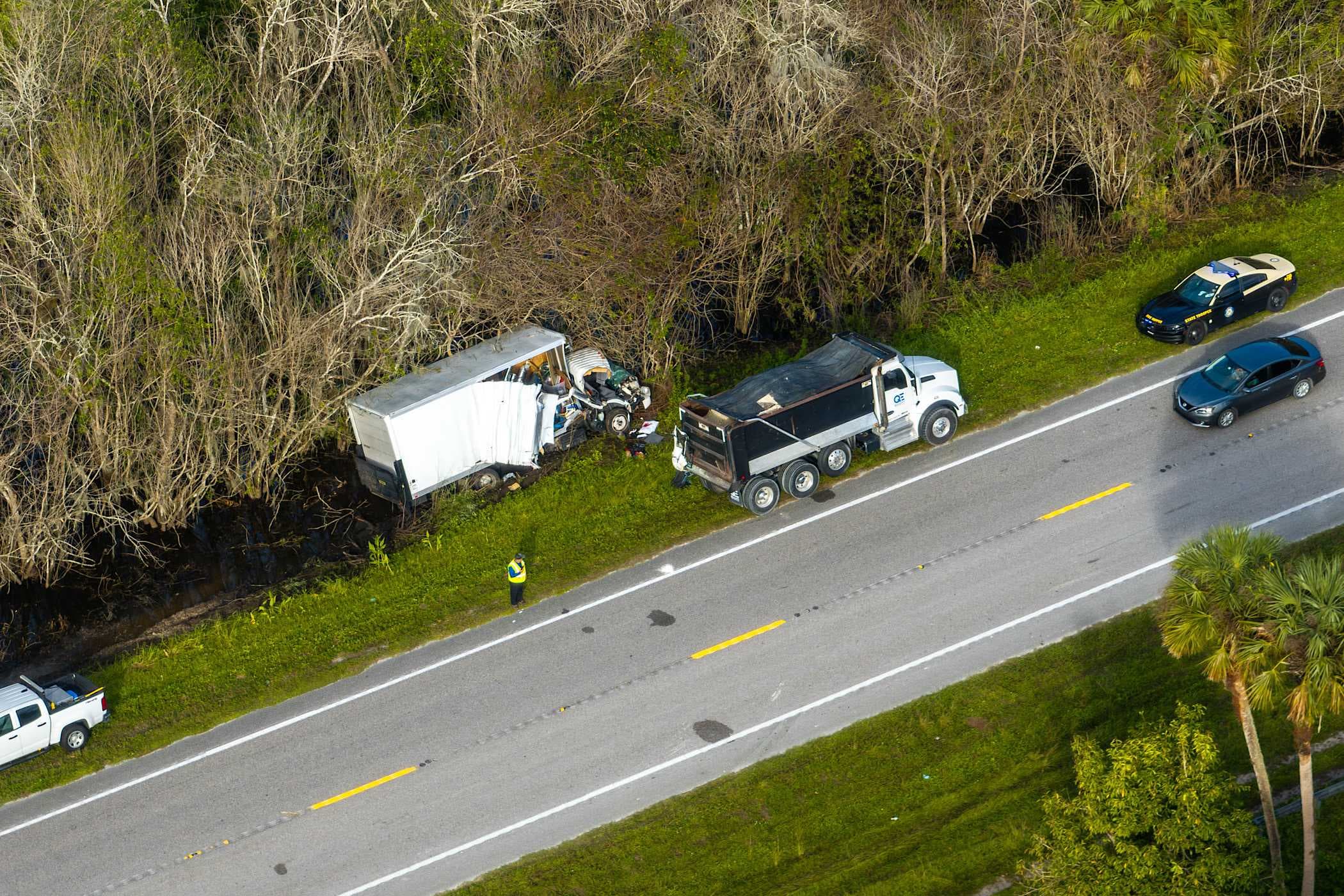At least one person injured after 2 large trucks crash along SR-29