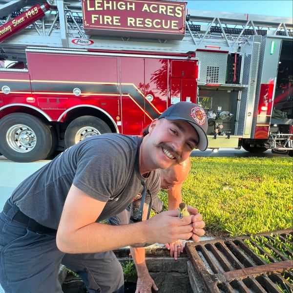 Lehigh Acres firefighter saves ducks from water grate