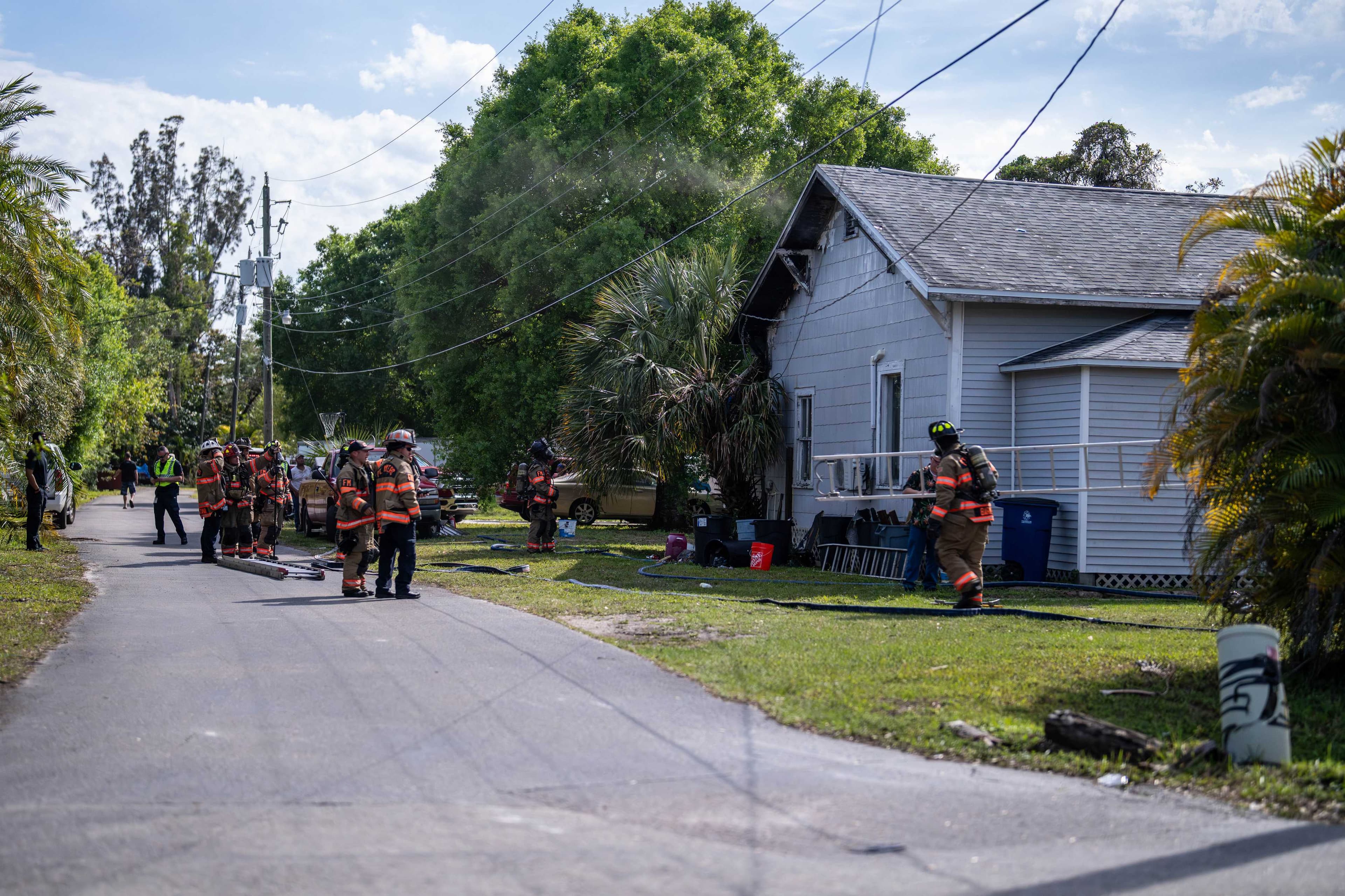 Crews battle flames after blowtorch ignites palm frond, house in Fort Myers
