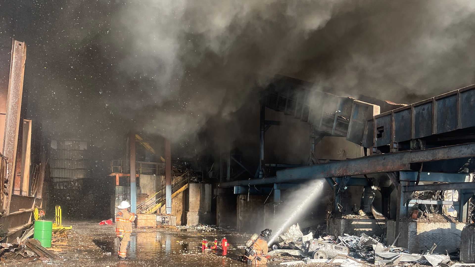 Crews battle warehouse fire at recycling facility in Fort Myers