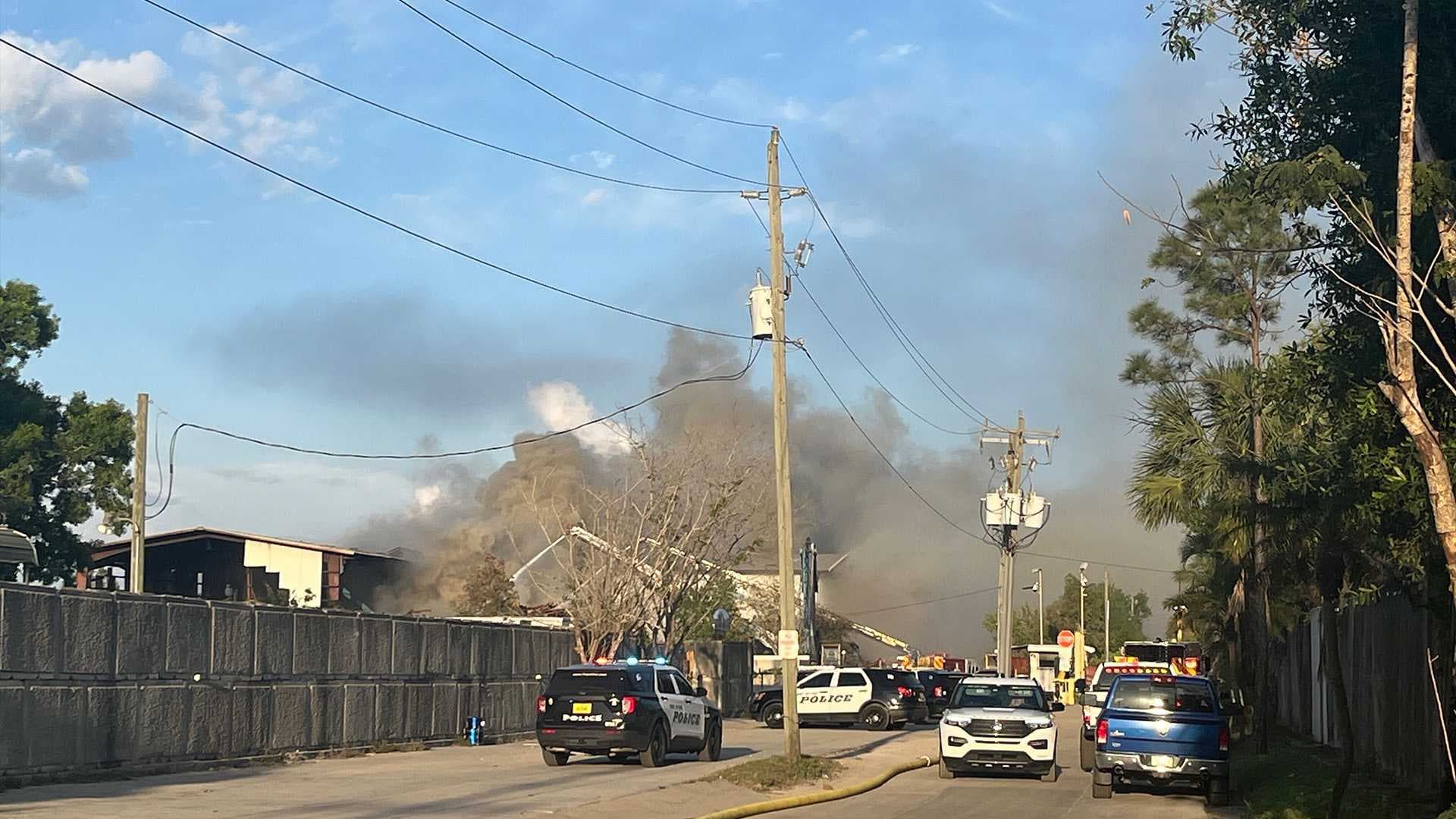 Crews battle warehouse fire at metal scrapyard in Fort Myers