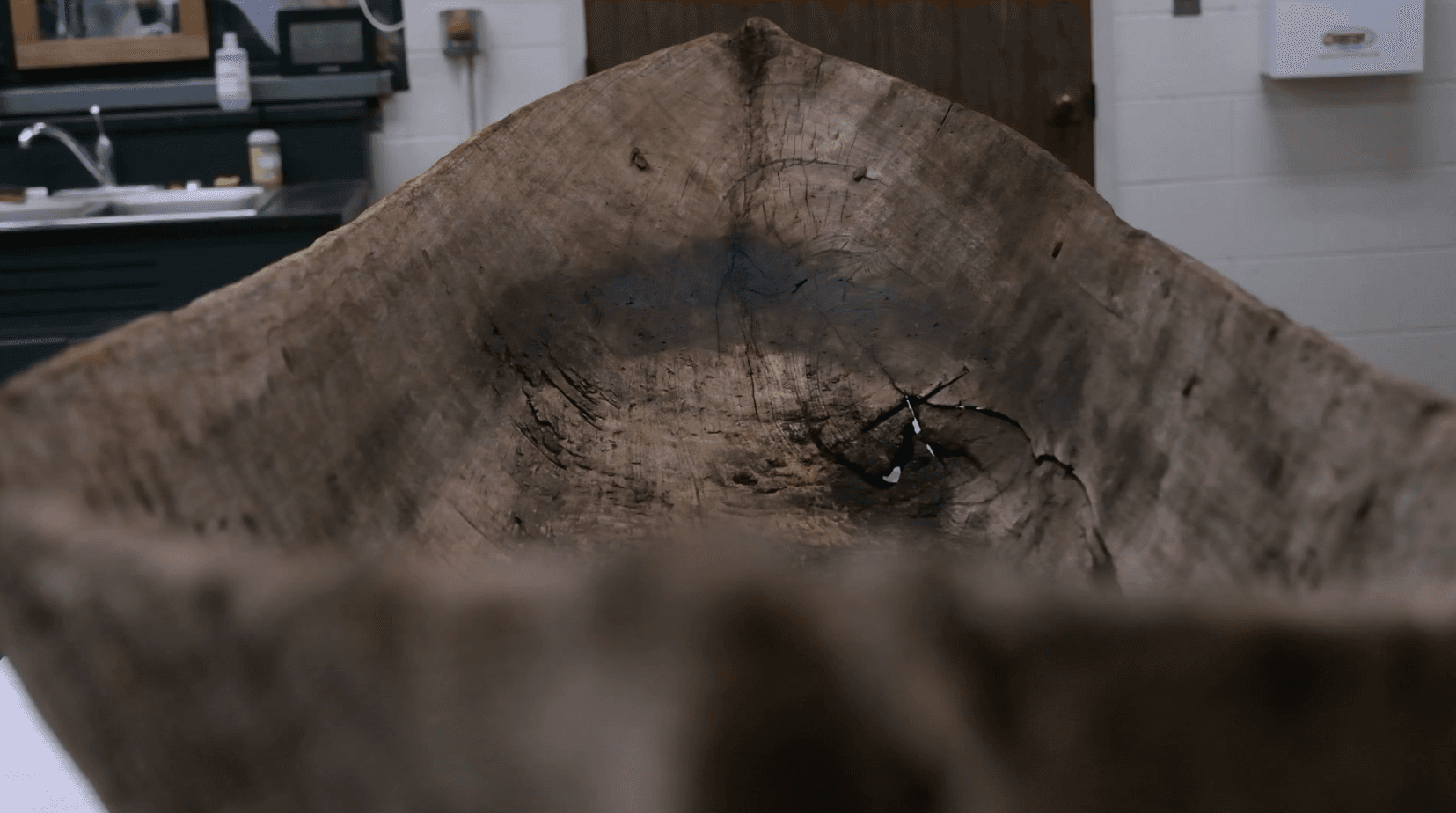 State works to preserve historic canoe that washed into yard during Ian