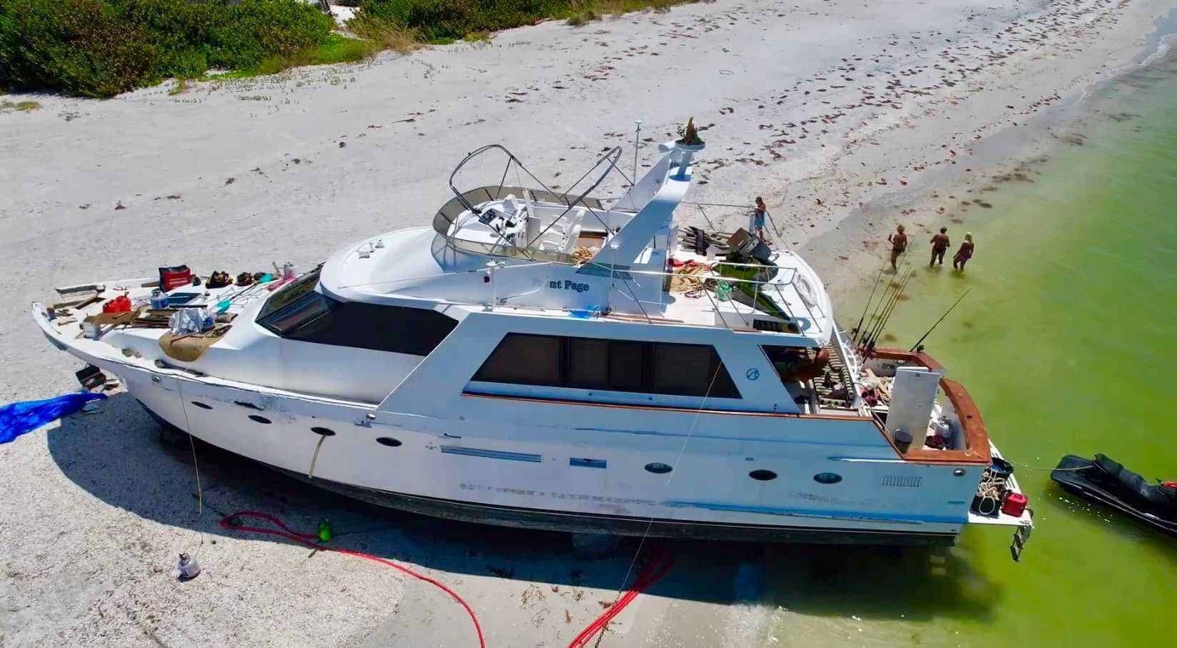 Boat stuck along Cayo Costa shore