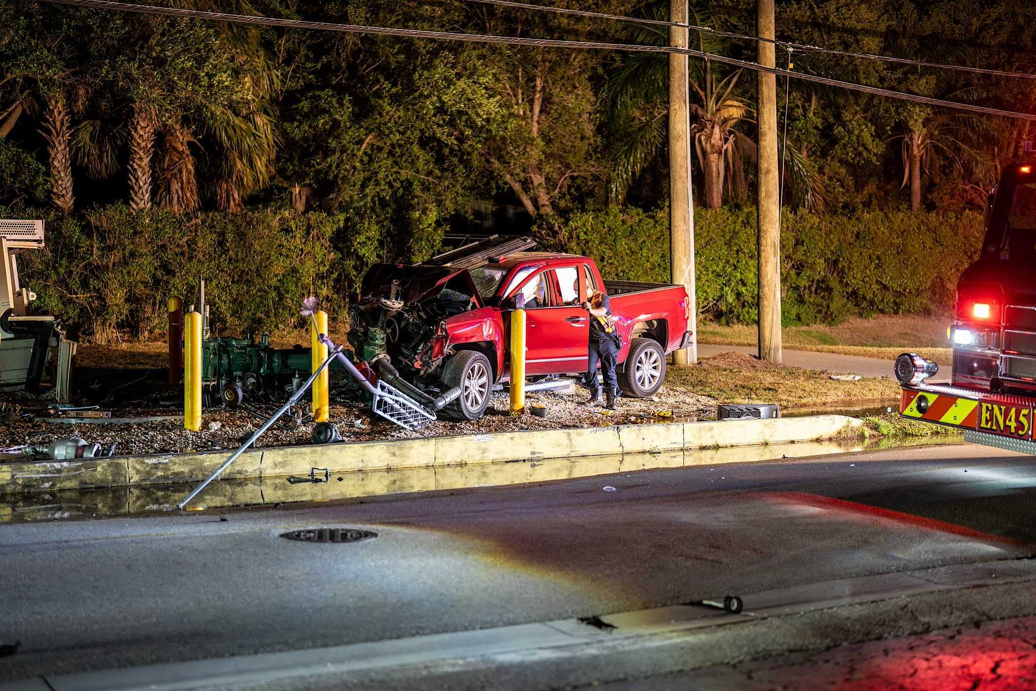 Driver injured after pickup truck crashes into sewage pipe at lift station in North Naples