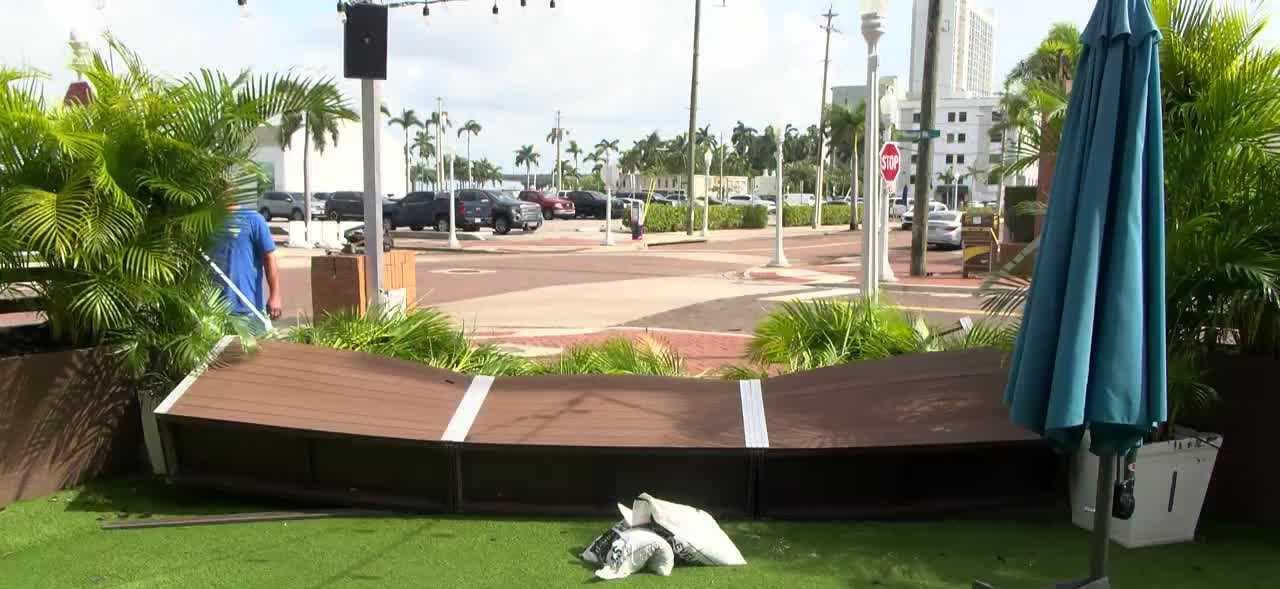 Businesses in Downtown Fort Myers clean up leftover debris from Hurricane Helene