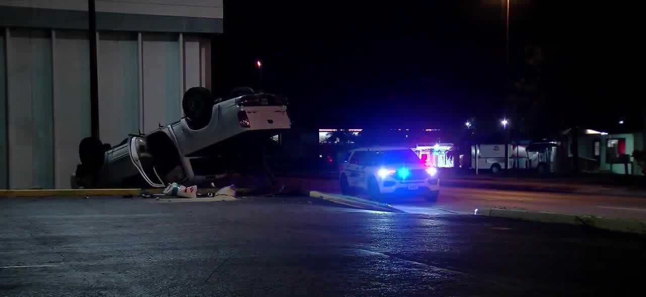 Pickup truck flips over on palm tree in Tice, deputies investigate